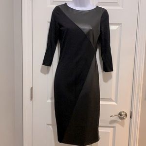 Black faux leather/jersey dress.